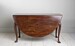 Max Rollitt George III Cuban mahogany oval drop-leaf table