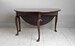Max Rollitt George III Cuban mahogany oval drop-leaf table