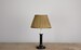 Max Rollitt Bespoke candlestick lamp with dune malabar lampshade